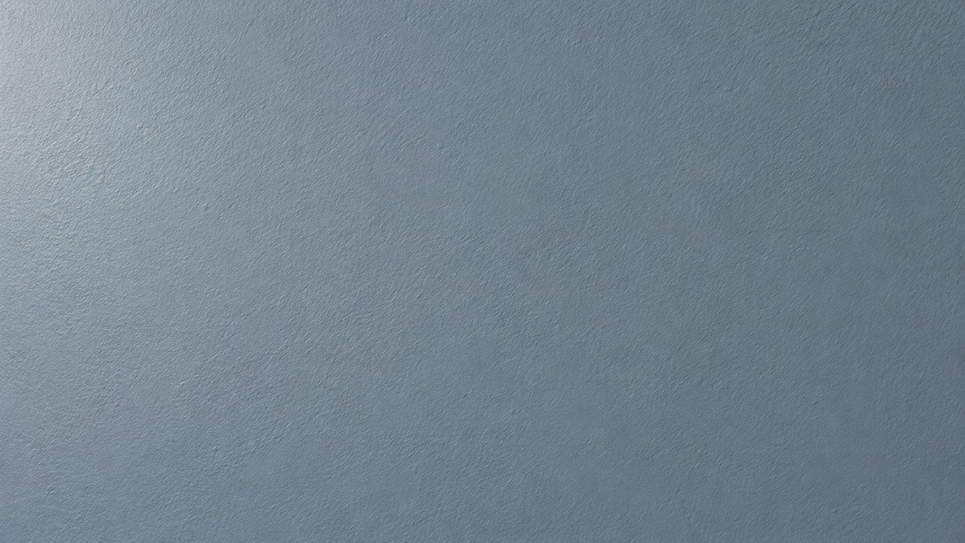 Surface peinte bleu-gris mate avec une microtexture et très peu de reflets