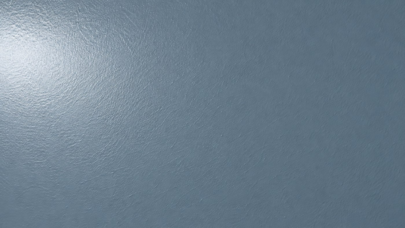 Surface peinte bleu-gris satinée éclairée latéralement, avec un reflet plus marqué
